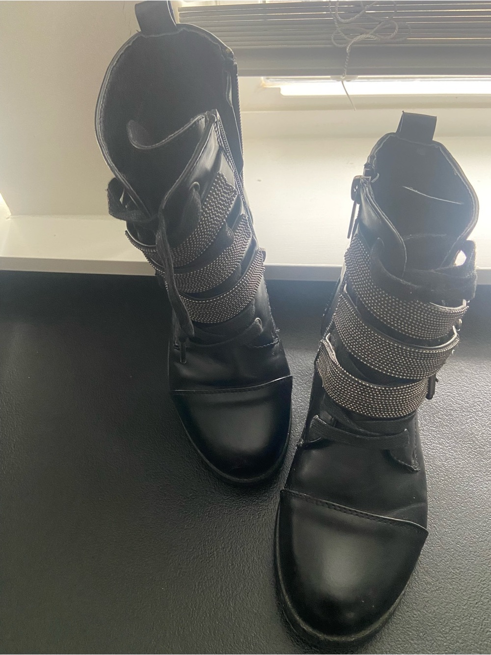 Black Strappy Ankle Boots with Metallic Accent